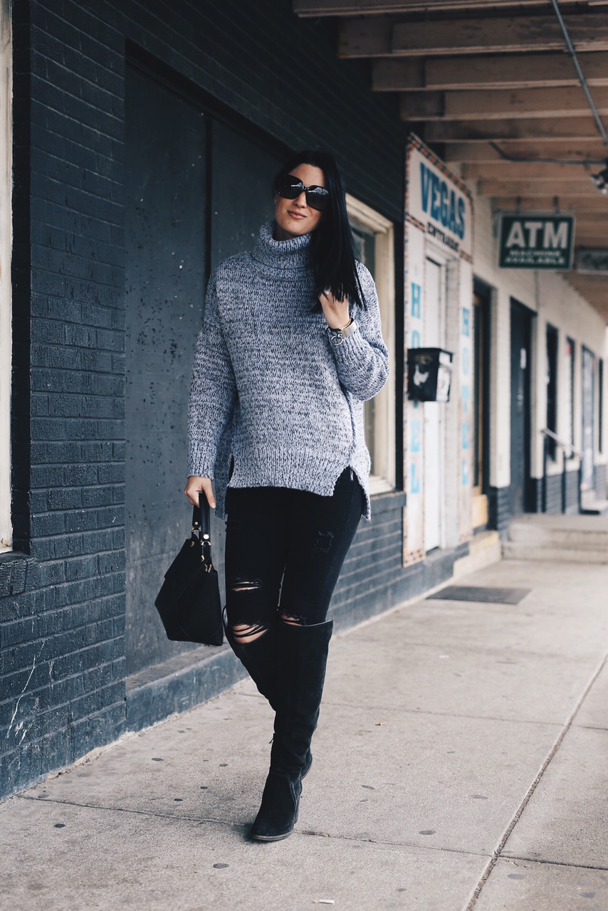 Ashley Hargrove of DTKAustin is wearing a Chicwish sweater, Henri Bendel Bag and Vince Camuto Boots