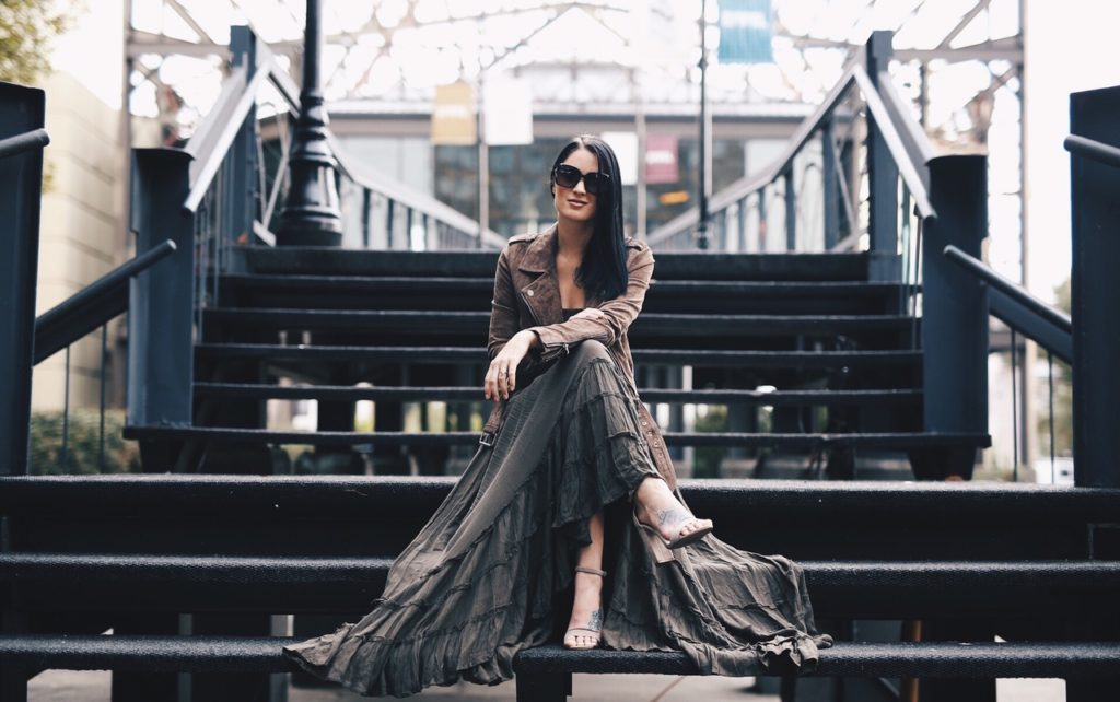 Ashley Hargrove of DTKAustin is wearing a free people maxi dress, Blank NYC leather jacket and Steve Madden shoes in New Orleans