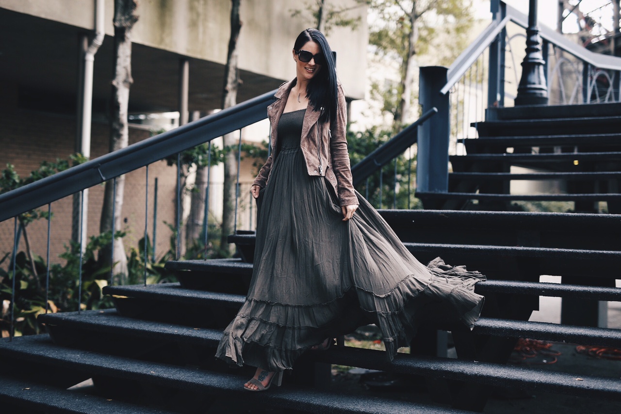 Ashley Hargrove of DTKAustin is wearing a free people maxi dress, Blank NYC leather jacket and Steve Madden shoes in New Orleans