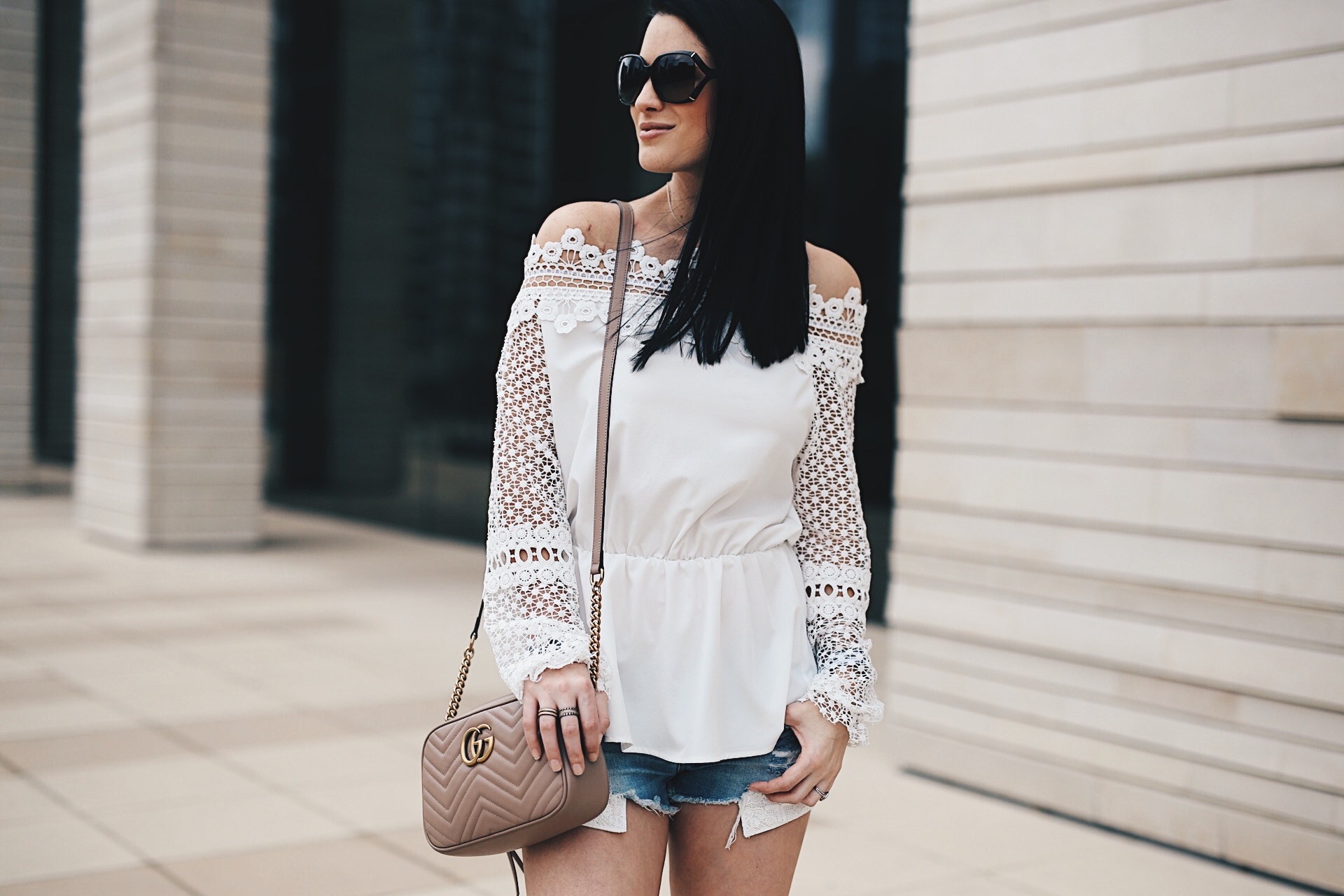 DTKAustin shows us how to wear the highly coveted off-the-shoulder trend with Chicwish, cutoff shorts and wedges from Stuart Weitzman. Want more summer inspiration? Click to get more details!