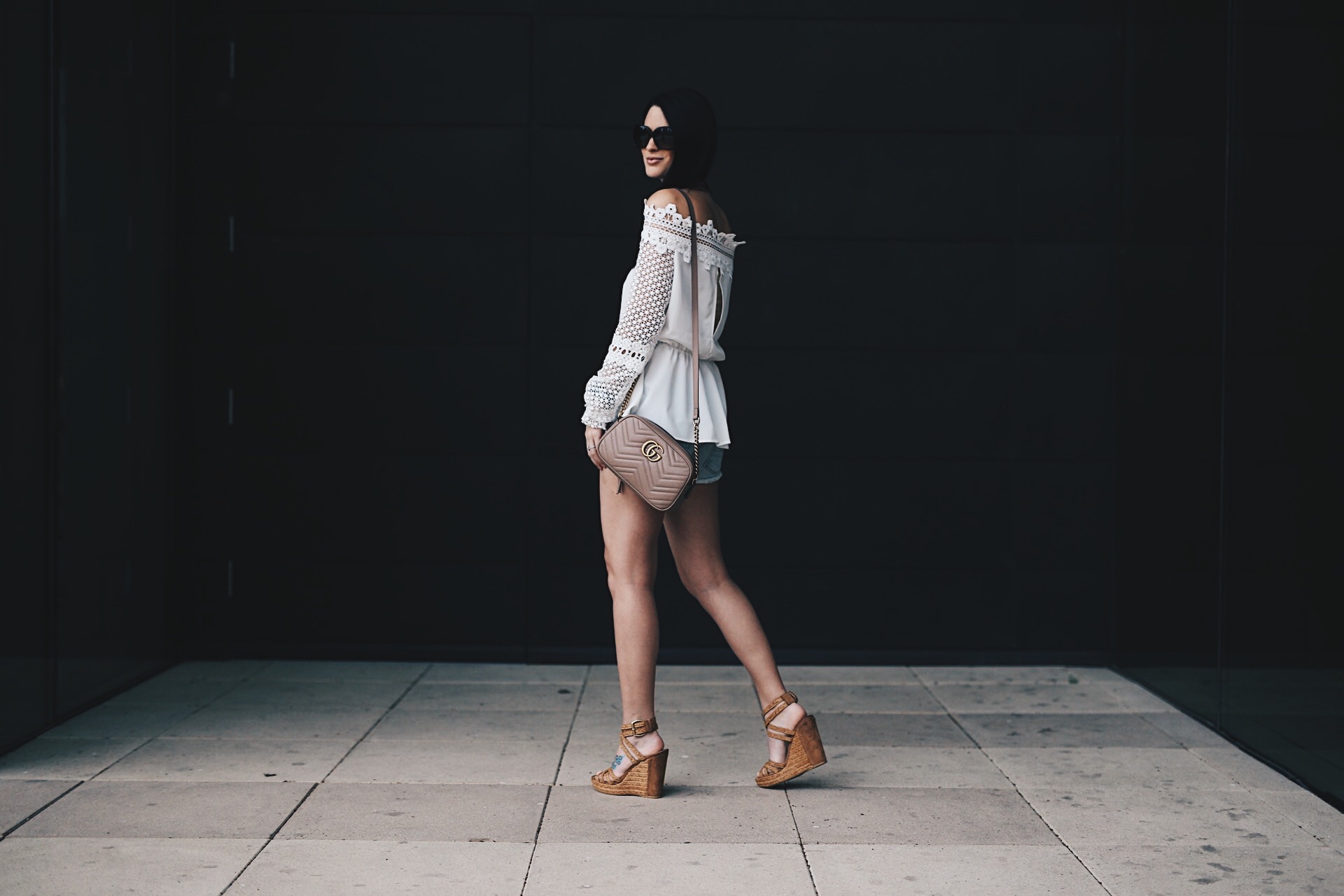 DTKAustin shows us how to wear the highly coveted off-the-shoulder trend with Chicwish, cutoff shorts and wedges from Stuart Weitzman. Want more summer inspiration? Click to get more details!
