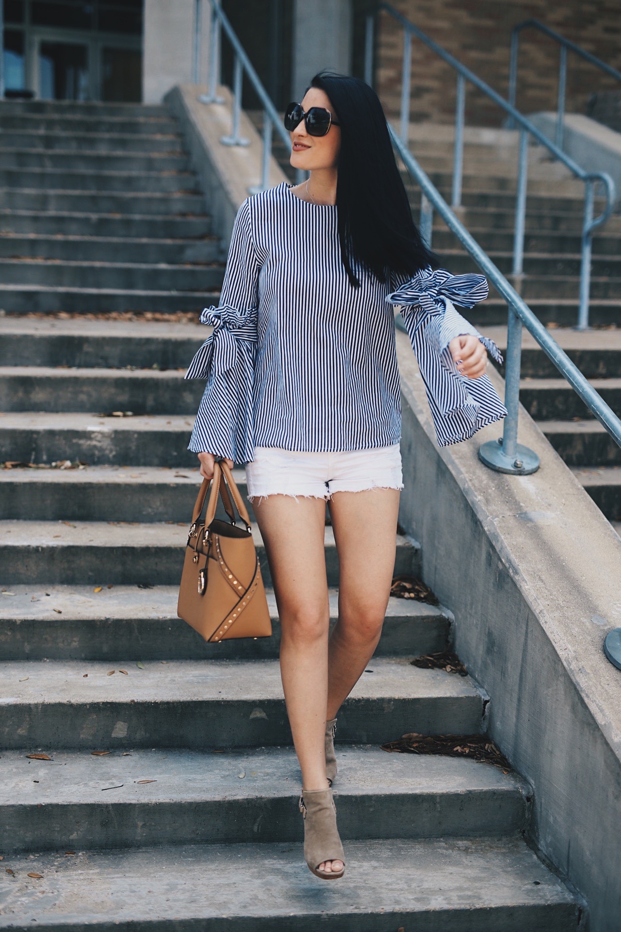 Ashley of DTK Austin shares her favorite summer bell-sleeved top from Chicwish with a Henri Bendel tote. Click for more information and photos of the perfect summer outfit.