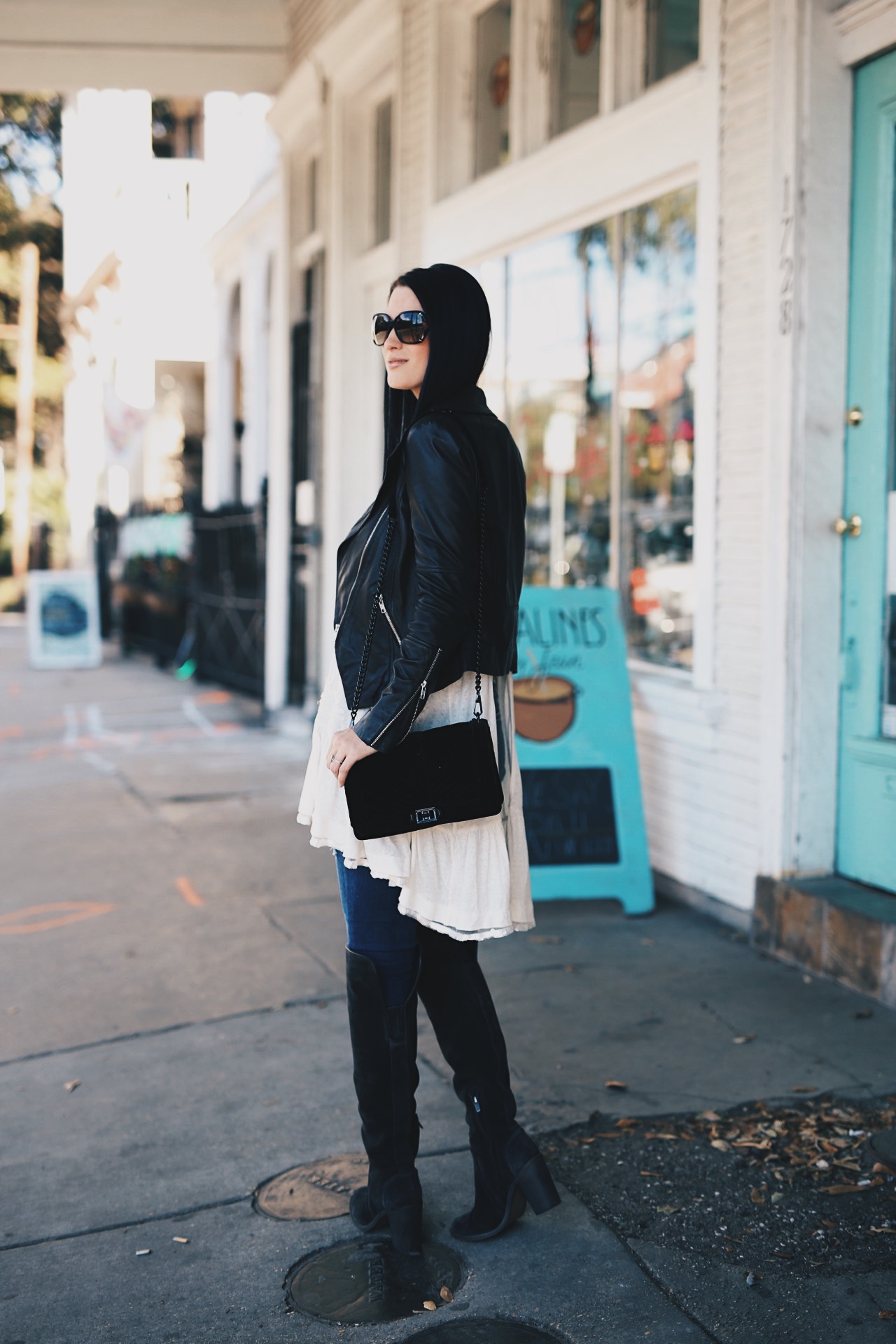 DTKAustin is sharing her favorite white free people top shot while in New Orleans. Ashley is carrying a Rebecca Minkoff Love bag and wearing Vince Camuto OTK Boots. Click to get more info and pics!