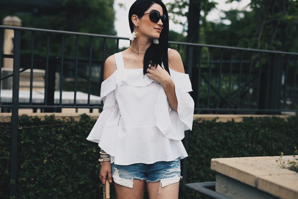 DTKAustin shares one of the most affordable summer looks to keep you cute and cool. This seersucker top from Nordstrom is amazing with a pair of cutoff shorts. Click for more information and shopping details.