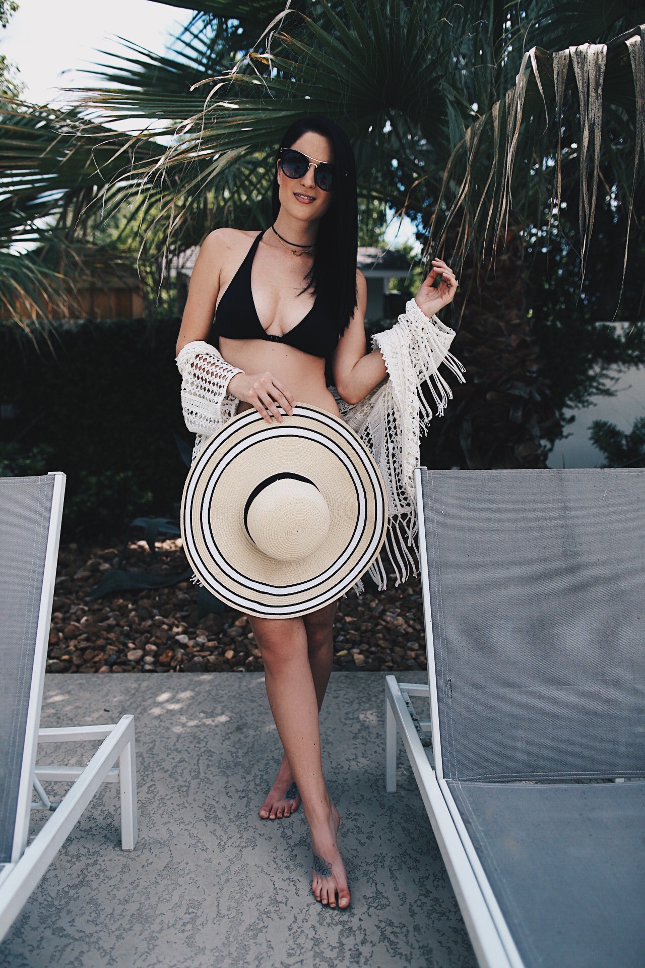 DTKAustin is sharing her pool day essentials and favorite affordable little black bikinis! Click for more pool day pics and outfit details.