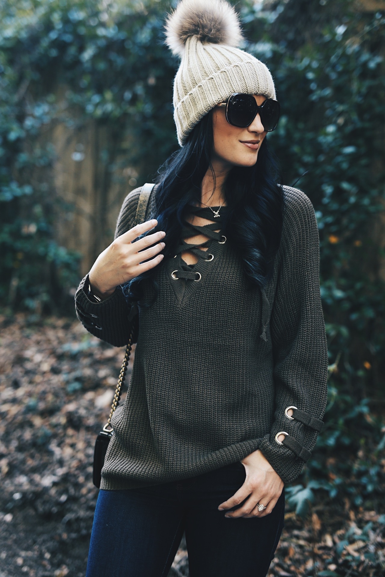 DTKAustin is sharing her fave olive green lace up sweater from Honeybum. Use code DTK20 for 20% your entire order. Bang - Chanel, Booties - Lucky Brand | olive green lace up fall sweater | how to style a lace up sweater | fall sweater fashion | fall fashion tips | fall outfit ideas | fall style tips | what to wear for fall | cool weather fashion | fashion for fall | style tips for fall | outfit ideas for fall || Dressed to Kill #fallstyle #fallsweaters #laceupsweater 