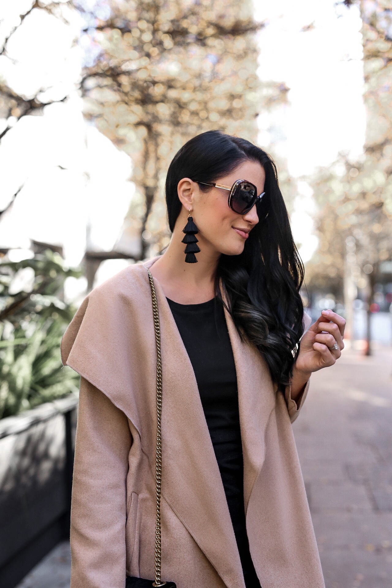 DTKAustin shares her top affordable coats from Chicwish that are under $100. Handbag from Henri Bendel, OTK boots from Goodnight Macaroon. | winter coats for women | how to style winter coats | affordable winter coats | winter style tips | winter fashion tips || Dressed to Kill #wintercoats #affordablewinterfashion #winterfashion -  10 Must-Have Classic Affordable Coats for Winter by Austin fashion blogger Dressed to Kill