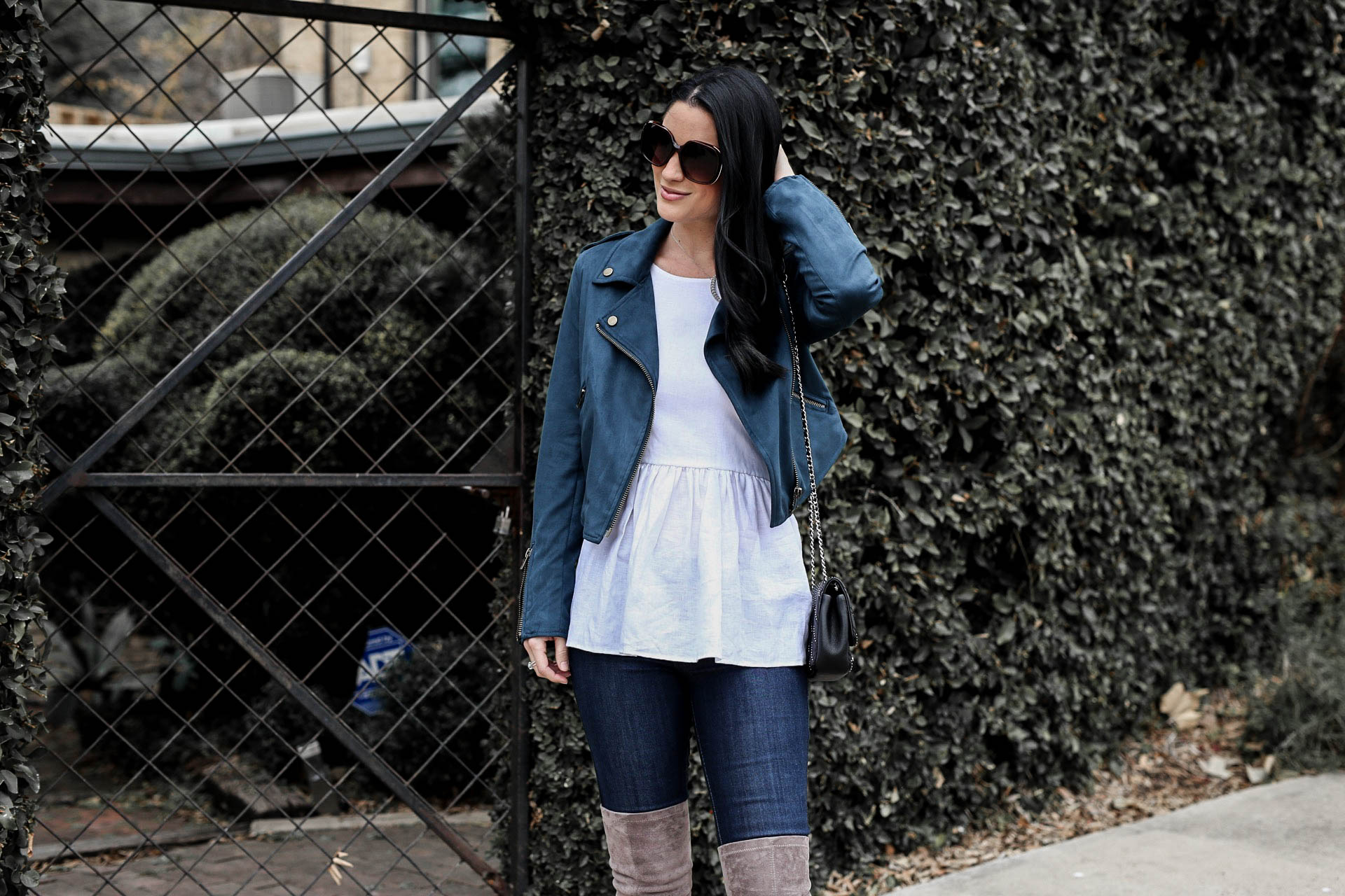 DTKAustin is sharing one of her favorite trends for every season; moto jackets. She is giving details on how to wear one and why you need to own a moto jacket. - Teal Moto Jacket by popular Austin style blogger Dressed to Kill