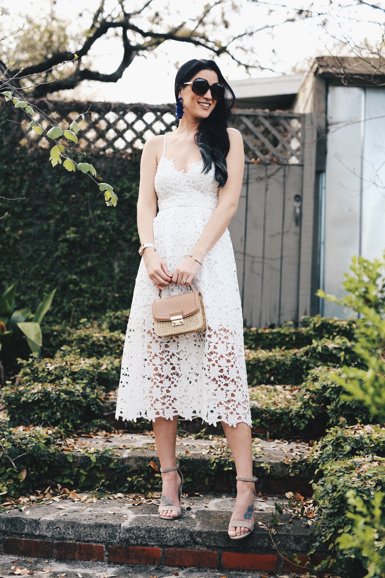 Cute Easter Dresses featured by top US fashion blog Dressed to Kill; Image of a woman wearing ASTR dress, Steve Madden shoes, H&M handbag, Marc Jacobs watch, Baublebar earrings, David Yurman bracelet and Nordstrom sunglasses.