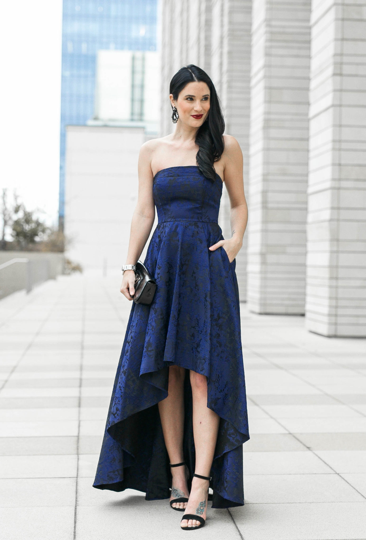 DTKAustin shares some of her favorite affordable gowns and dresses for special occasions or formal events. Laundry by Shelli Segal gown, Louis Vuitton clutch and Steve Madden heels. - High Low Dresses styled by popular Austin fashion blogger Dressed to Kill