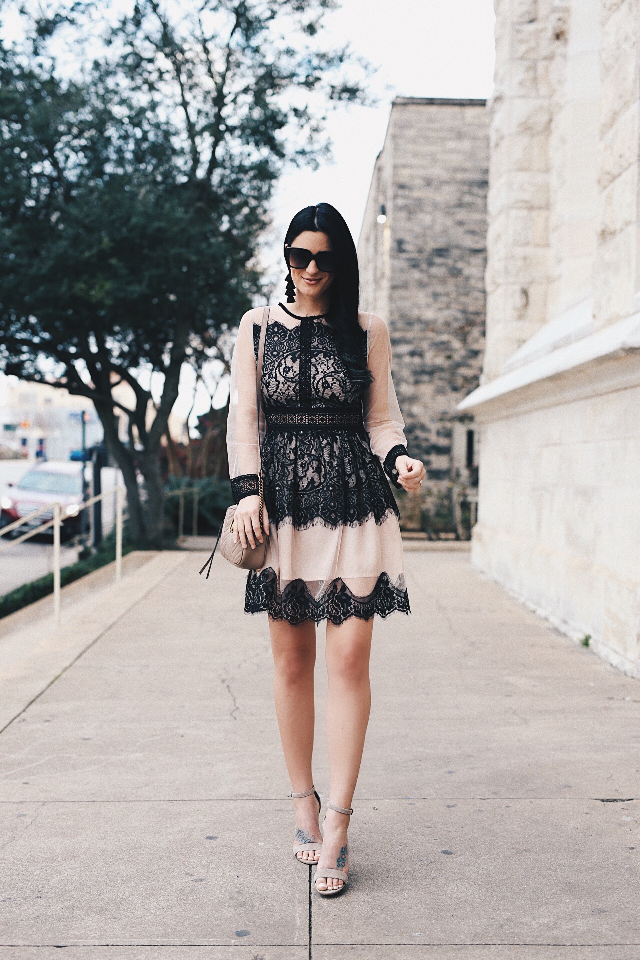 DTKAustin shares the perfect, lightweight dress that you can transition into summer for those cooler days. Gucci Marmont Small Beige Crossbody, Chicwish Dress - Sheer Black Lace Dress styled by popular Austin fashion blogger, Dressed to Kill