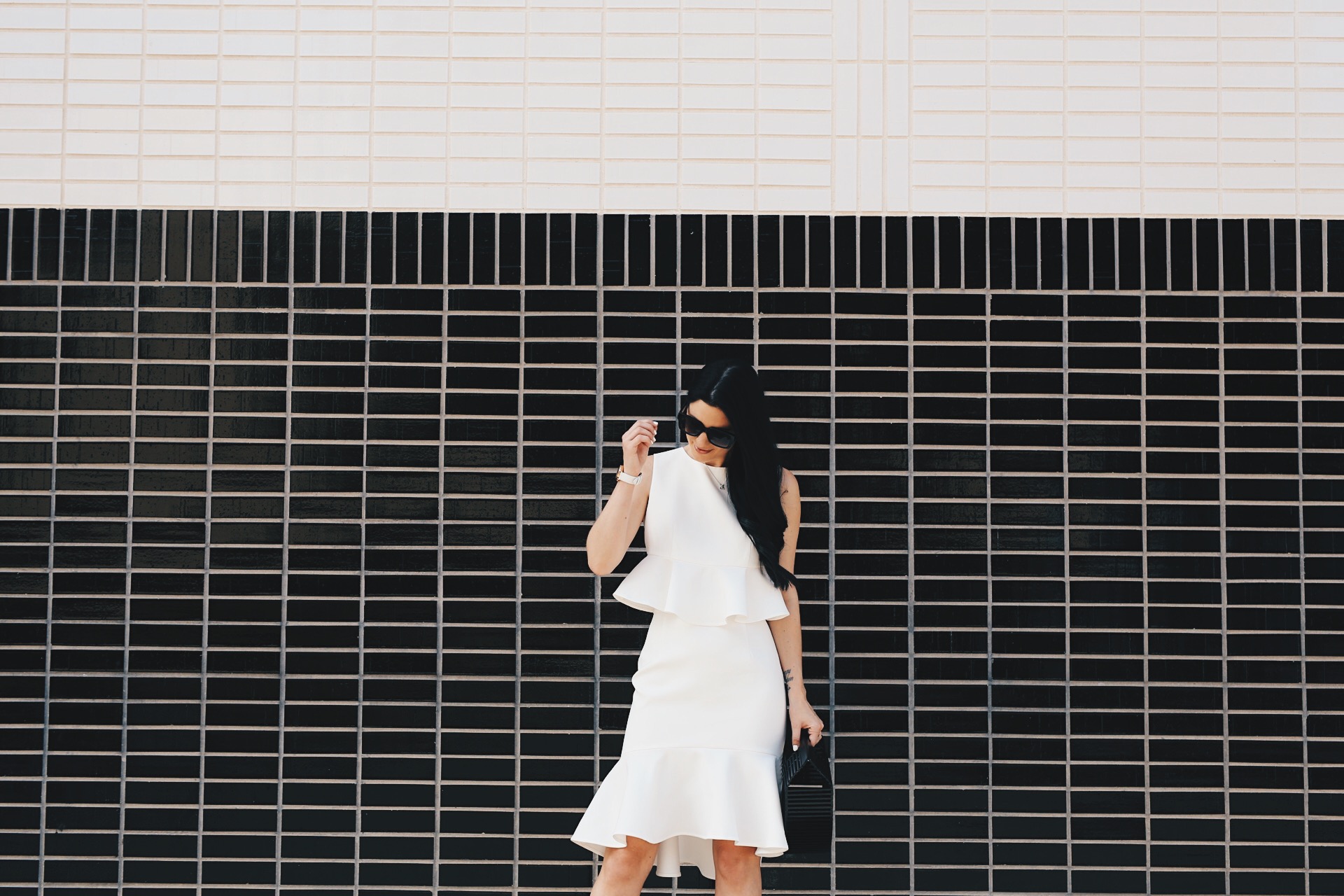DTKAustin shares a versatile white top and skirt set from Chicwish. Perfect for Spring/Summer and the upcoming Kentucky Derby. Black Bamboo bag from Red Dress Boutique or Cult Gaia. - White Two Piece Set styled by popular Austin fashion blogger, Dressed to Kill