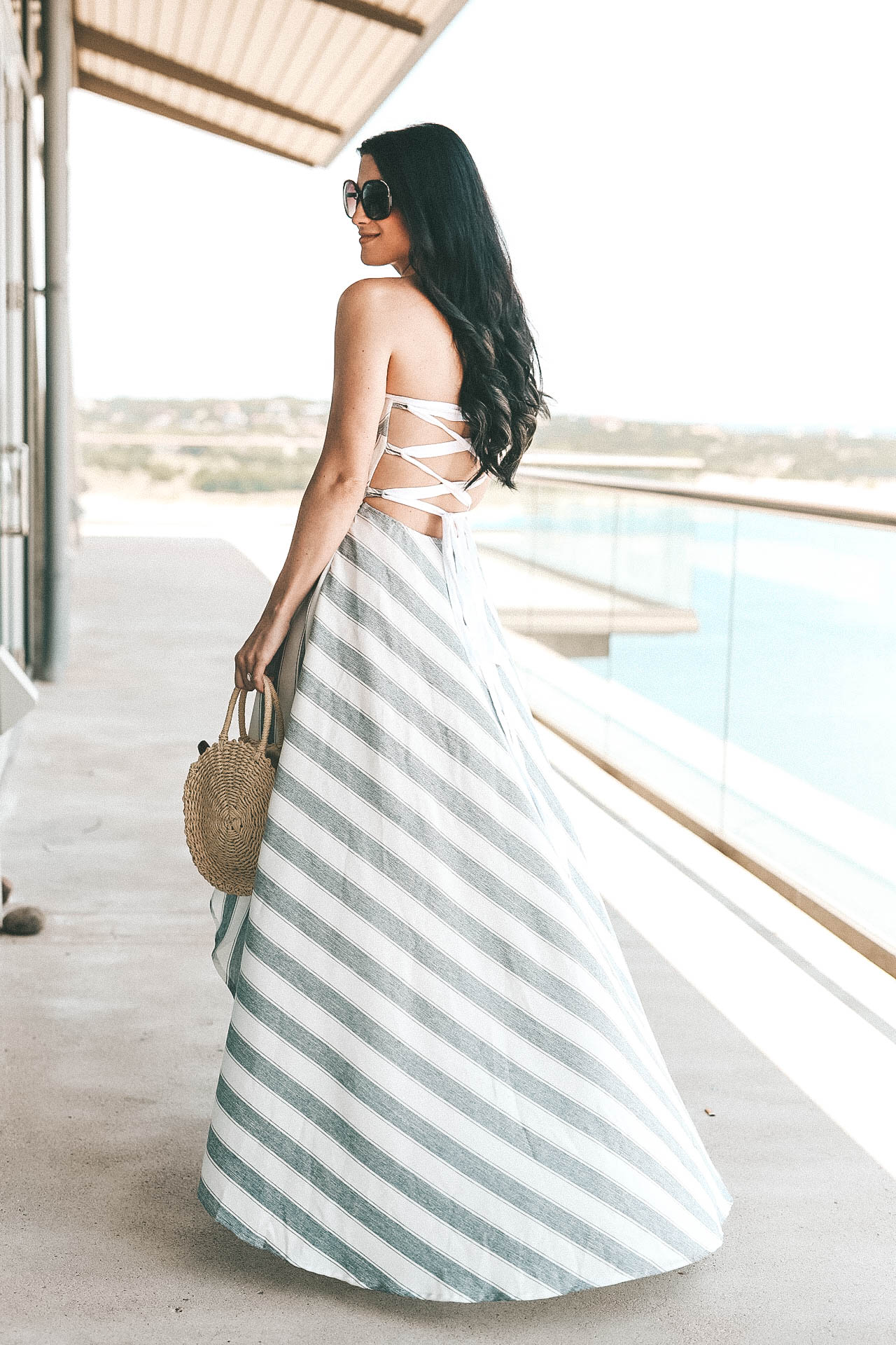 DTKAustin shares an affordable lace up maxi dress perfect for summer. Dress is AKIRA, bag is Clare V, shoes Steve Madden. | summer dresses for women | summer style | summer fashion | summer outfits for women | how to style a lace up dress || Dressed to Kill #fashion #style #womensoutfit #laceupdress #summerdress #summerfashion #summerstyle #dtkaustin - {The Lace-Up Dress of Your Dreams} featured by popular Austin fashion blogger, Dressed to Kill