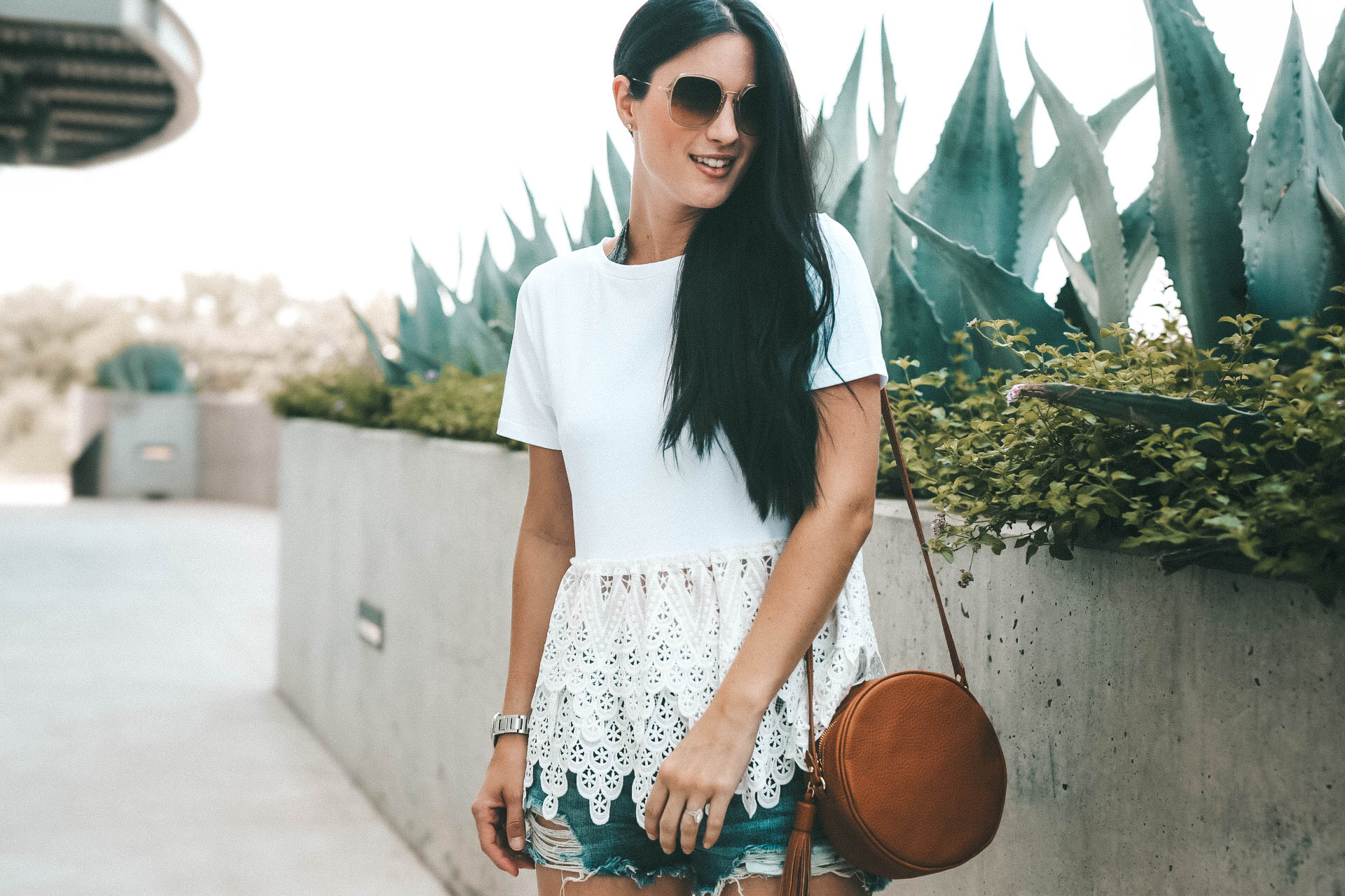 the perfect white lace peplum top for summer from Chicwish. It is under $30 and an affordable staple top. - {How to Wear a Crochet Peplum Top + Why They are so Flattering} featured by popular Austin fashion blogger Dressed to Kill