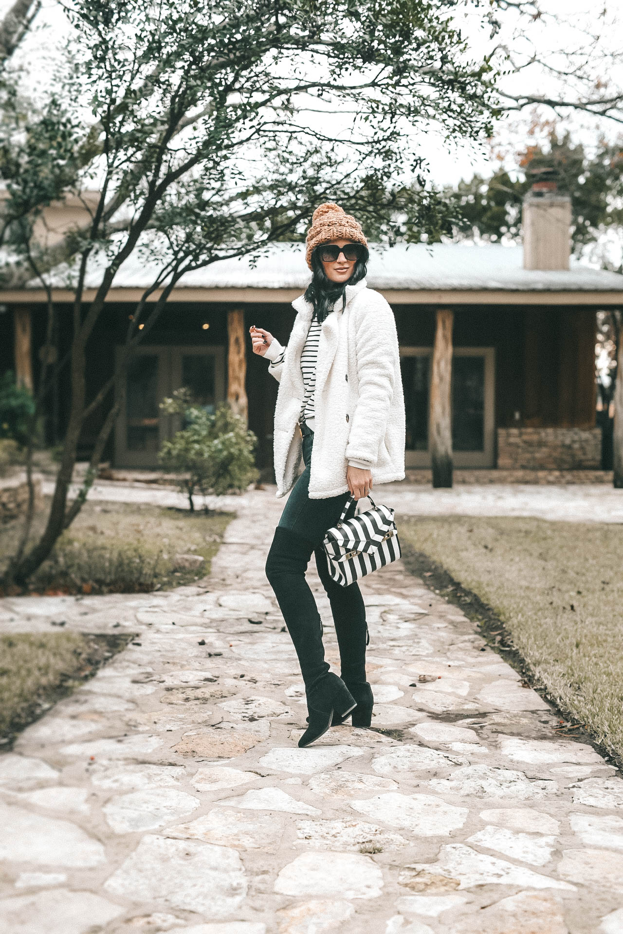 DTKAustin is sharing the most affordable beaded striped sweater from Chicwish. It is hand beaded with faux pearls and on sale for $45. Handbag is Henri Bendel, Over the Knee Boots Goodnight Macaroon, Teddy Bear coat is Goodnight Macaroon, Knit beanie is Abercrombie. || Dressed to Kill #fashion #style #womensoutfit #womensfashion #stripedsweater #knit #knitsweater #winterstyle #streetstyle #winterfashion #dtkaustin