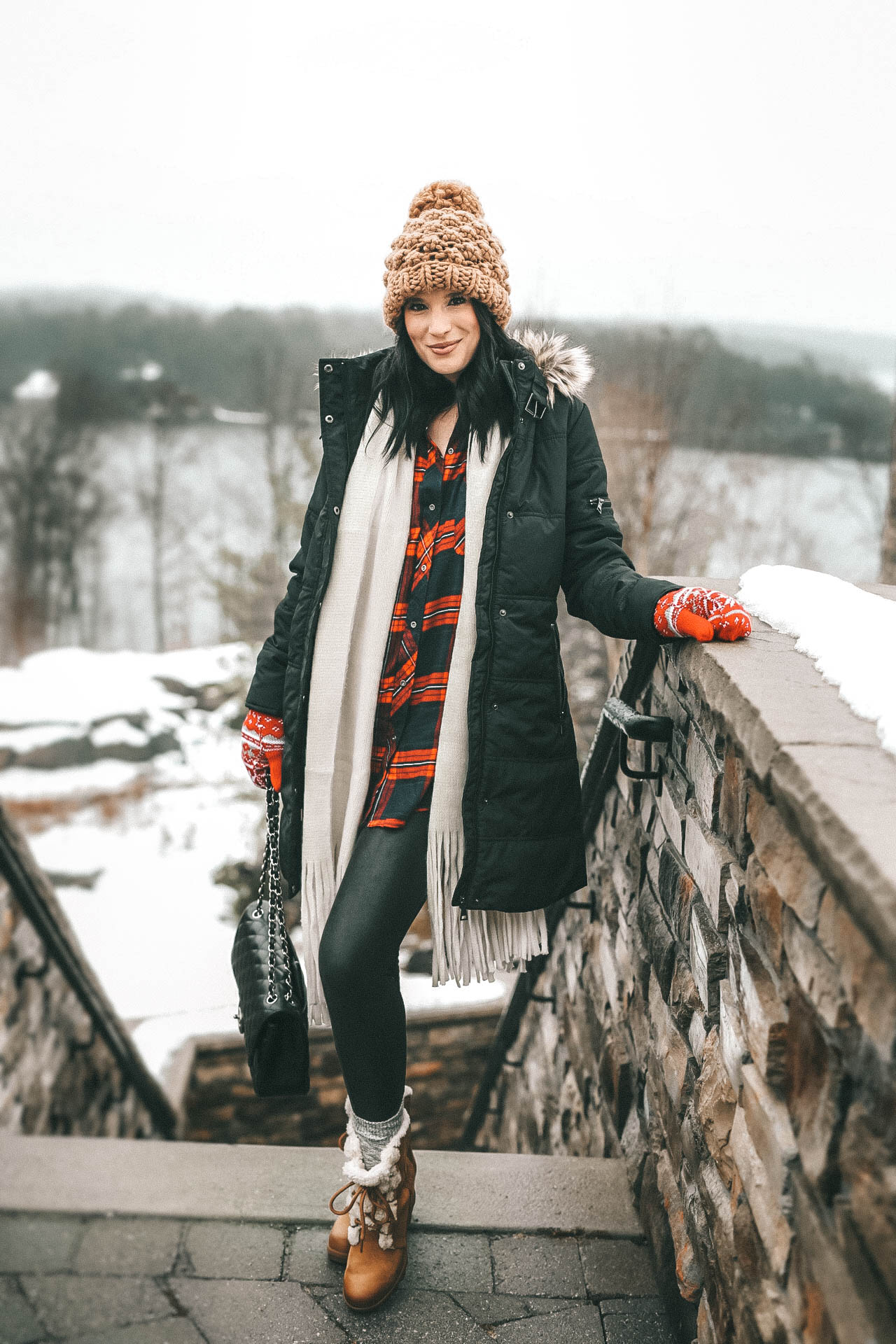The Rosseau Muskoka featured by top US travel blog Dressed to Kill; Woman in cute winter outfit 