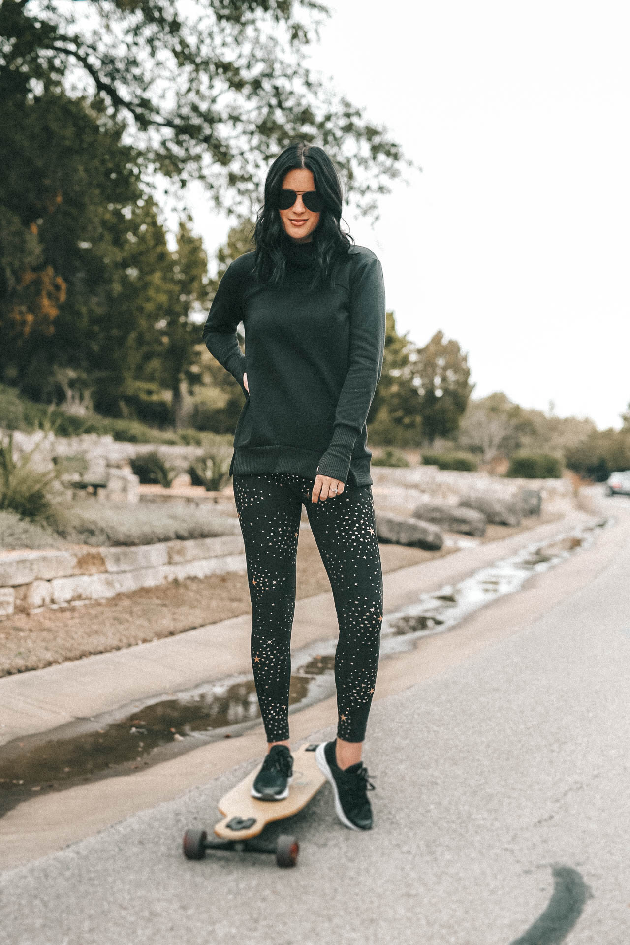 Affordable Activewear featured by top US fashion blog Dressed to Kill; Women wearing Walmart workout legging standing in the road.
