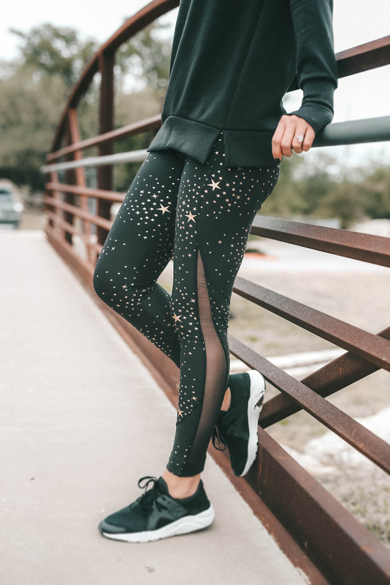 Affordable Activewear featured by top US fashion blog Dressed to Kill; Women wearing Walmart workout legging standing on bridge.