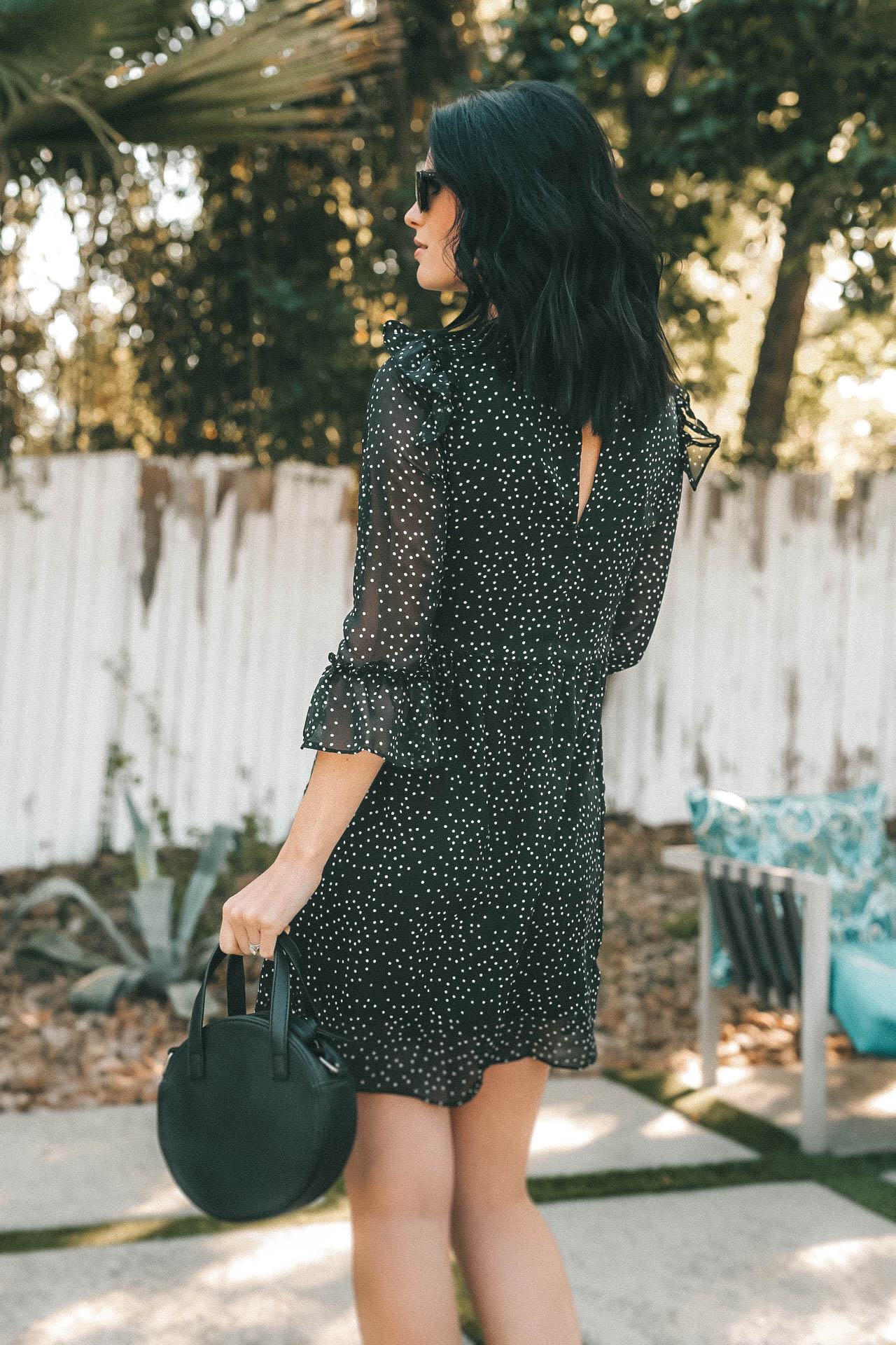 #ad This Polka Dot Dress from @Walmart makes a perfect summer statement! Pair it with a wedge heel, a handbag and sunnies and you're ready for a summer night out! || Dressed to Kill #sponsored #WeDressAmerica #WalmartFashion #summerstyle  | We Dress America Walmart campaign featured by top US fashion blog, Dressed to Kill: image of a woman wearing a Walmart polka dot mini dress, Walmart crossbody circle bag, and Walmart wedge sandals