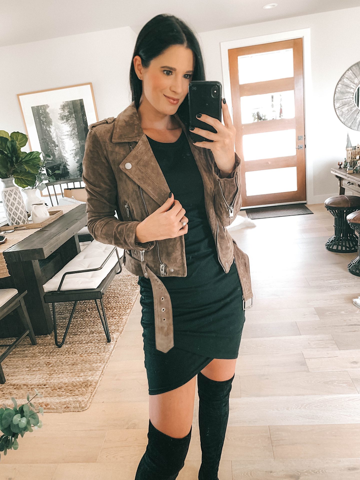 How to wear a suede moto jacket over a dress - Dressed to Kill