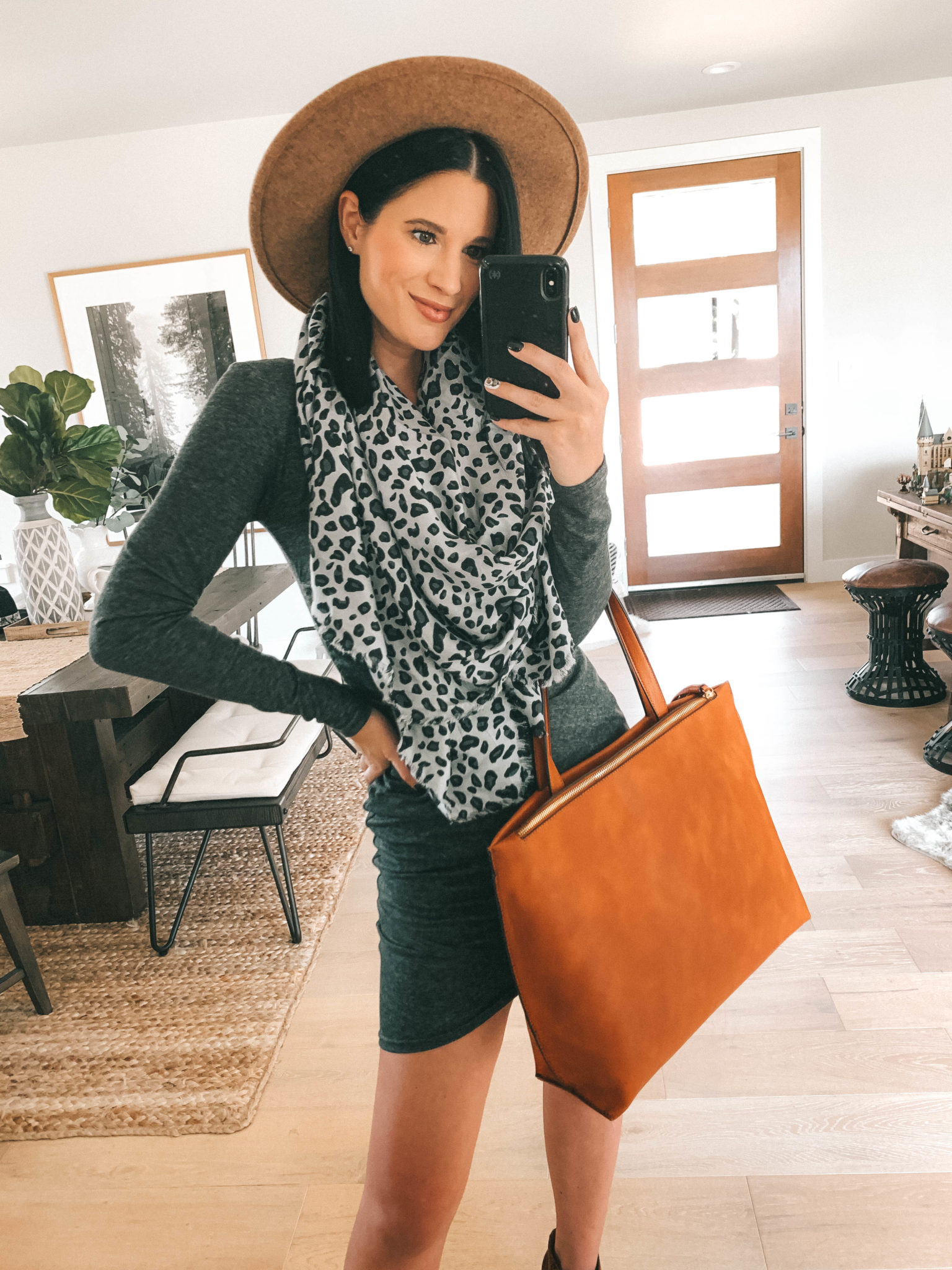 Must Have Sole Society Fall Staples by popular Austin fashion blog, Dressed to Kill: image of a woman wearing a grey rouched body-con dress, Sole Society Patsy Wedge Booties, leopard print oversized scarf, and holding a Wallis Tote.