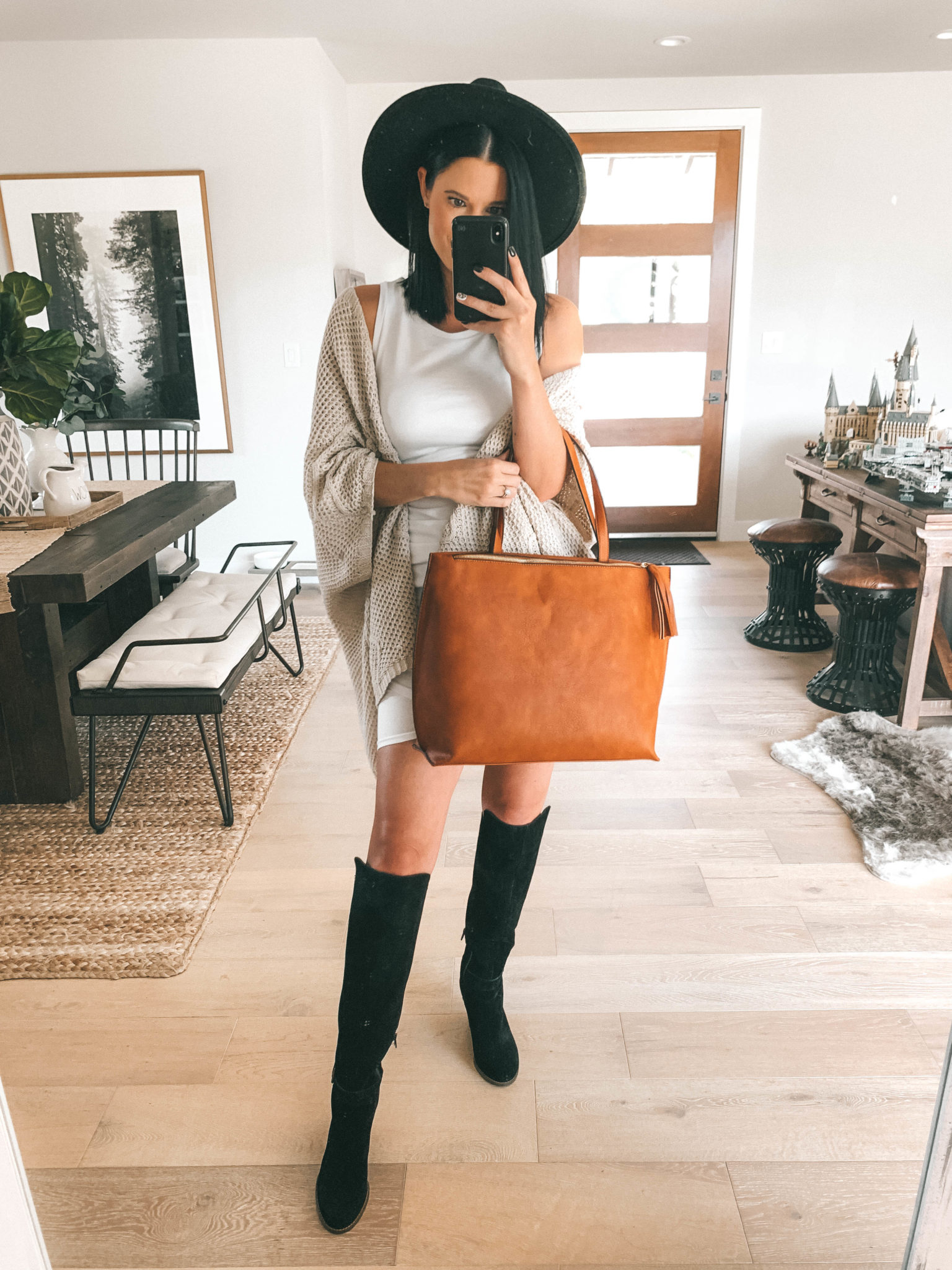 Must Have Sole Society Fall Staples by popular Austin fashion blog, Dressed to Kill: image of a woman wearing a Nordstrom Leith rouched body-con dress, Sole Society Paloma wedge boot, Sole Society Knit Detail Wrap, and holding a Sole Society Wallis Tote. 