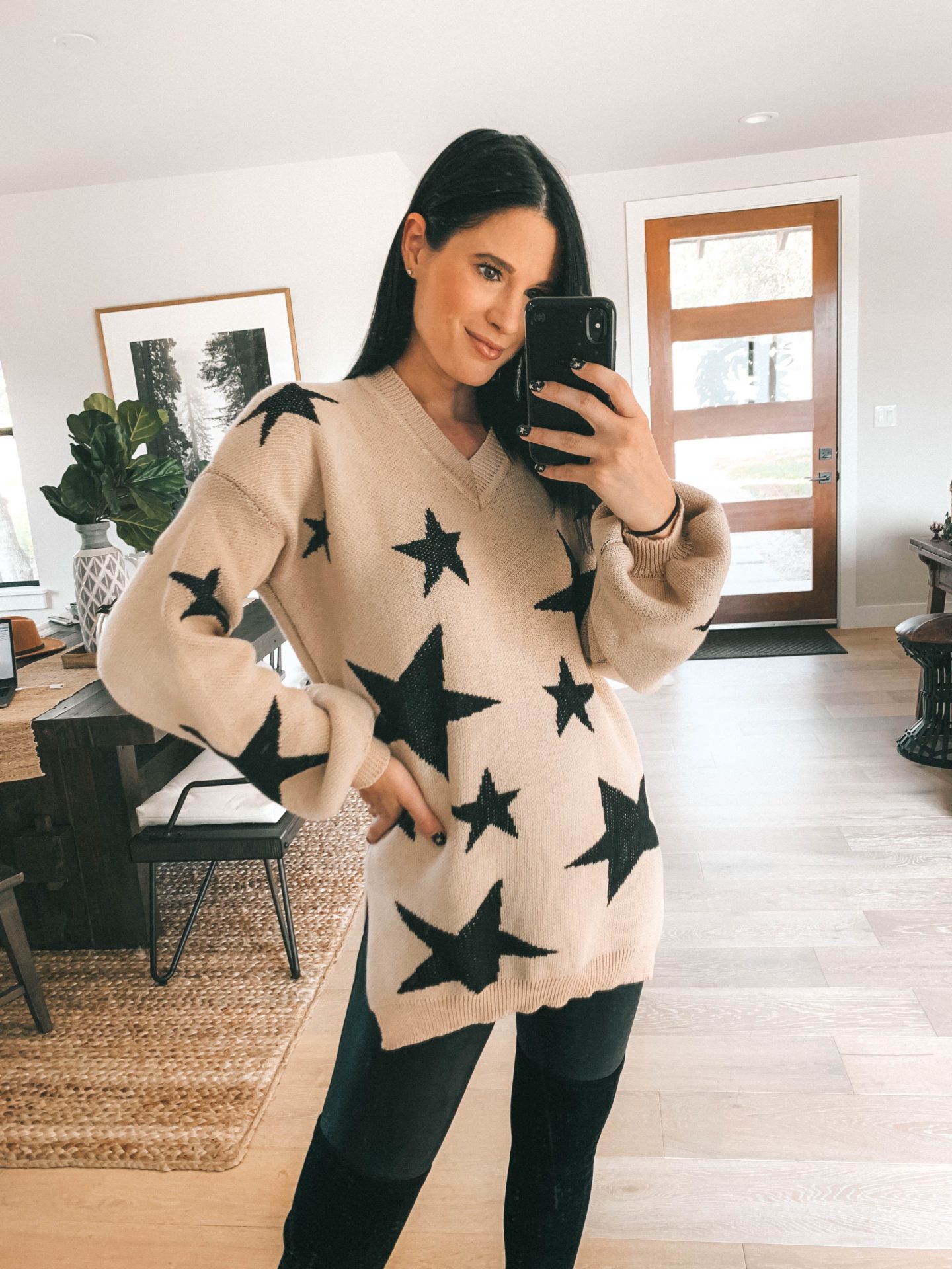 Must Have Staples From the Goodnight Macaroon Fall Collection by popular Austin fashion blog, Dressed to Kill: image of a woman wearing a Goodnight Macaroon 'ANNA' V-NECK STAR PATTERN SWEATER.