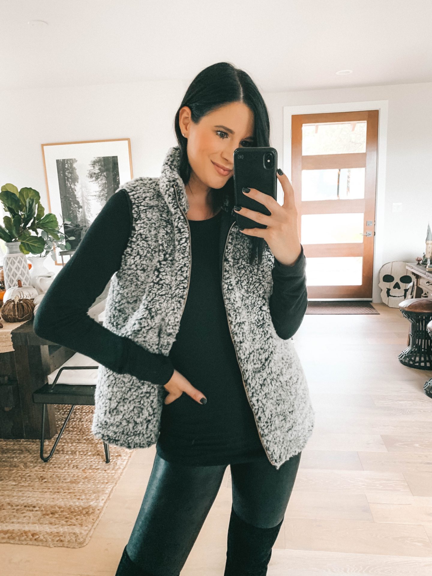 Must Have Staples From the Goodnight Macaroon Fall Collection by popular Austin fashion blog, Dressed to Kill: image of a woman wearing a Goodnight Macaroon 'IRAM' REVERSIBLE FLEECE VEST.