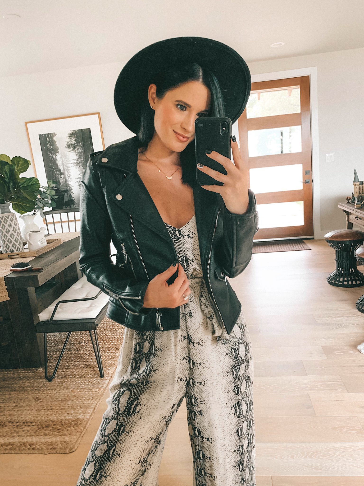Lovestitch Fall Outfit Try-On Session by popular Austin fashion blog, Dressed to Kill: image of a woman wearing a Lovestitch Laras Snakeskin Print Jumpsuit