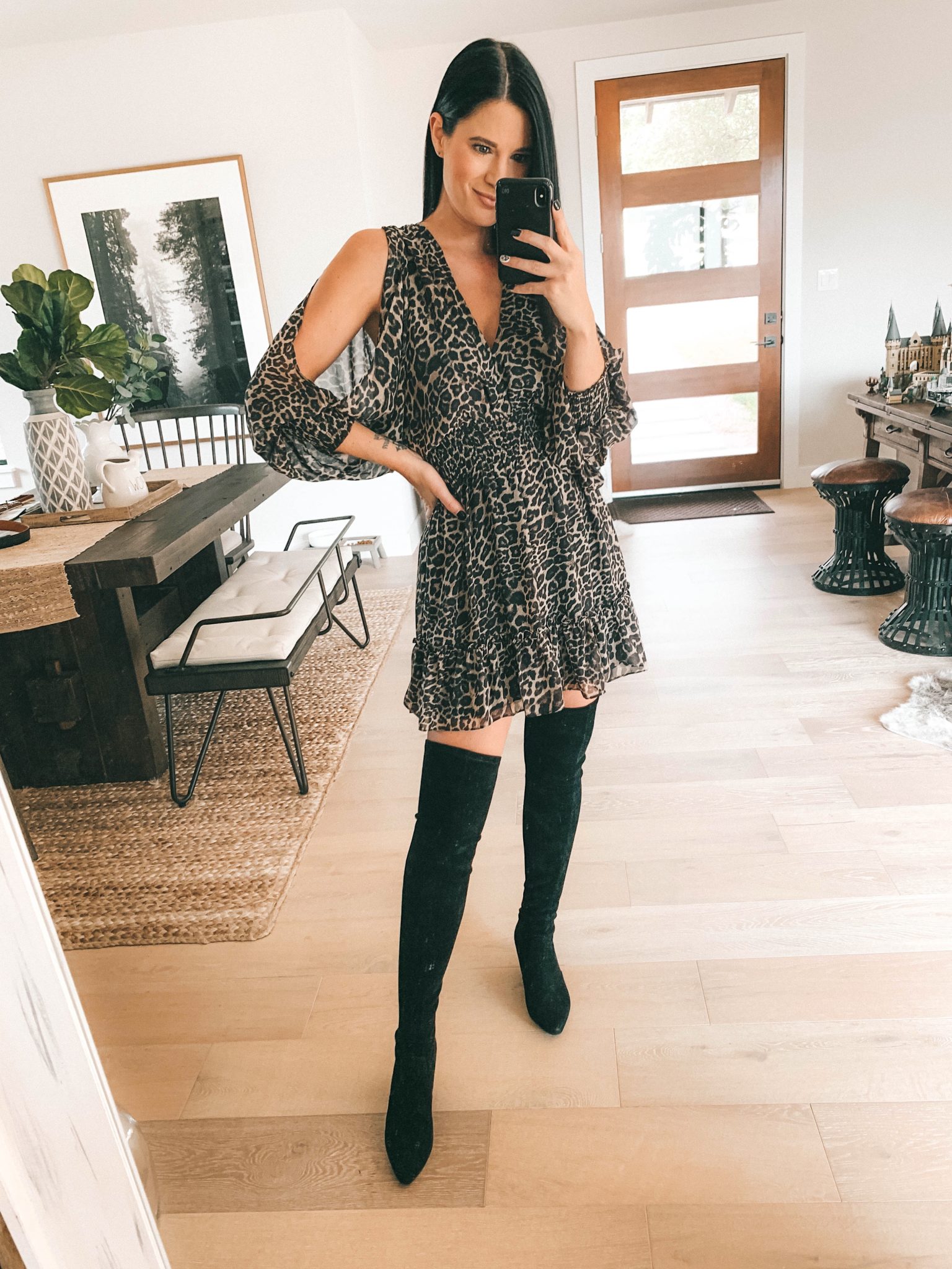 Lovestitch Fall Outfit Try-On Session by popular Austin fashion blog, Dressed to Kill: image of a woman wearing a Lovestitch leopard mini dress.