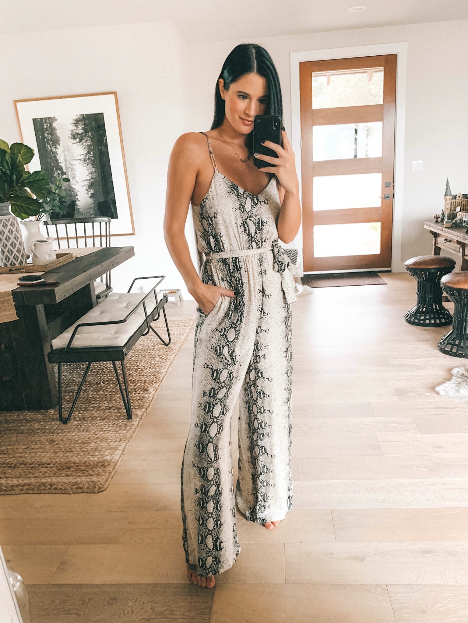 Lovestitch Fall Outfit Try-On Session by popular Austin fashion blog, Dressed to Kill: image of a woman wearing a Lovestitch Laras Snakeskin Print Jumpsuit.